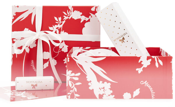 Box with face cream and lip balm