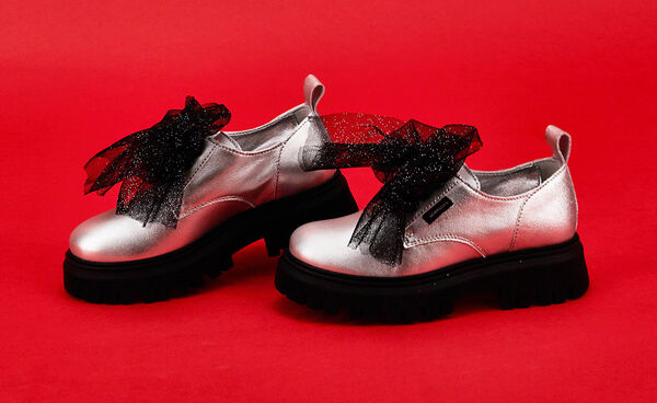 Zapatos estilo derby laminados