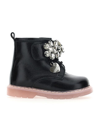 Patent leather combat boots with rhinestones