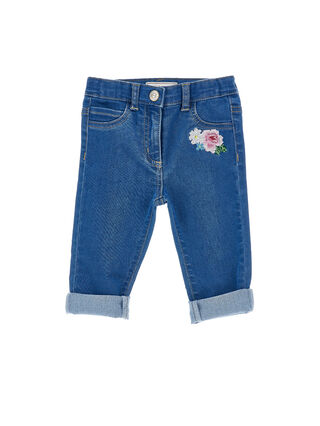 Джинсы с цветочной деталью