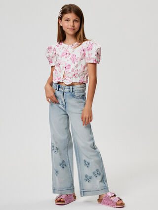 Шикарные джинсовые брюки с вышивкой