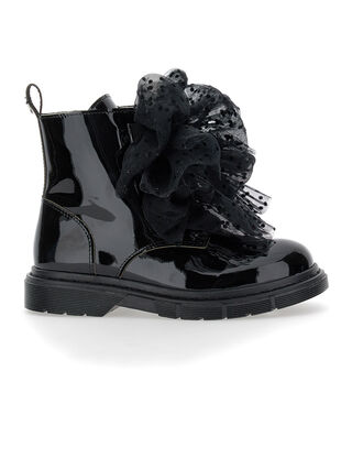 Sheepskin and leather combat boots with bows