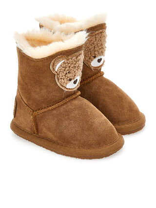 Crusted leather boots with teddy bear