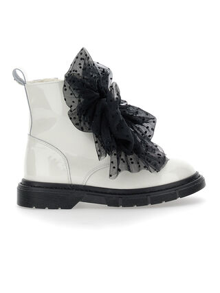 Sheepskin and leather combat boots with bows