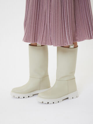 Botas de piel con forro de carnero